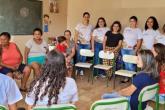 Foto da equipe que realizou o encontro, juntamente com as mulheres que frequentaram o grupo.